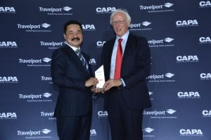 Rusdi Kirana accepting the Legends Award from CAPA's executive chairman Peter Harbison.