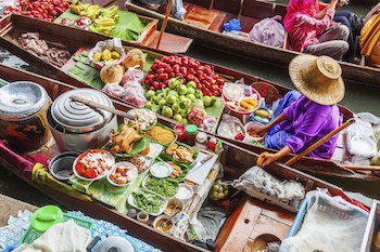 Bangkok ranks first in both arrivals number and total tourist expenditure. (Image credit - Bangkok floating market: Christian Mueller/iStock)