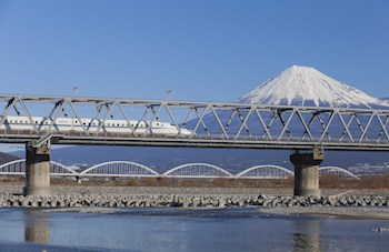 Bullet train Tokaido Shinkansen with view of mountain fuji at Shizuoka prefecture , Japan