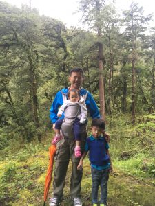 Herison and his kids, Laura and Nigel, hiking in Bhutan.