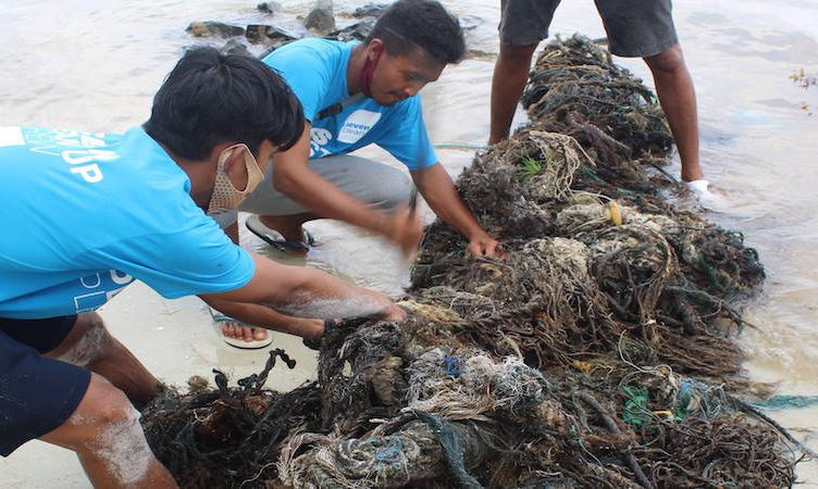 Seven Clean Seas employs furloughed tourism workers to clean beaches, goal is to help companies achieve plastic neutrality